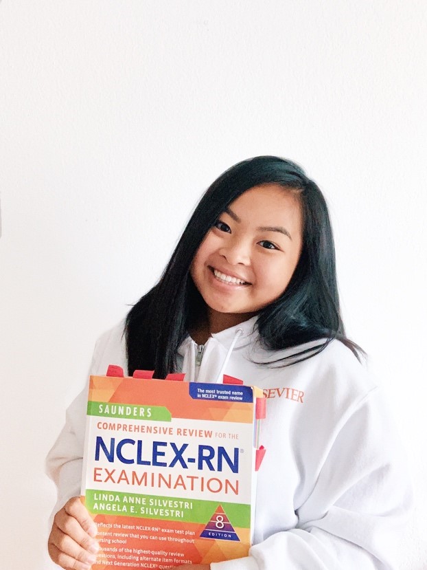 A person looking at the camera

Description automatically generated